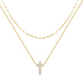 S925 sterling silver double layer cross pendant with twin diamond details on a clavicle chain.