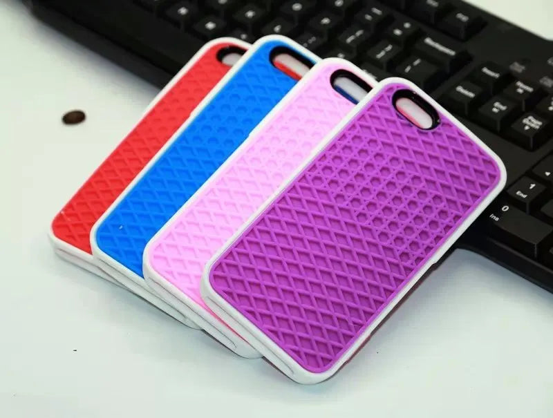 Waffle sole silicone phone case for iPhone 6s with checker pattern texture in black edge on brown background