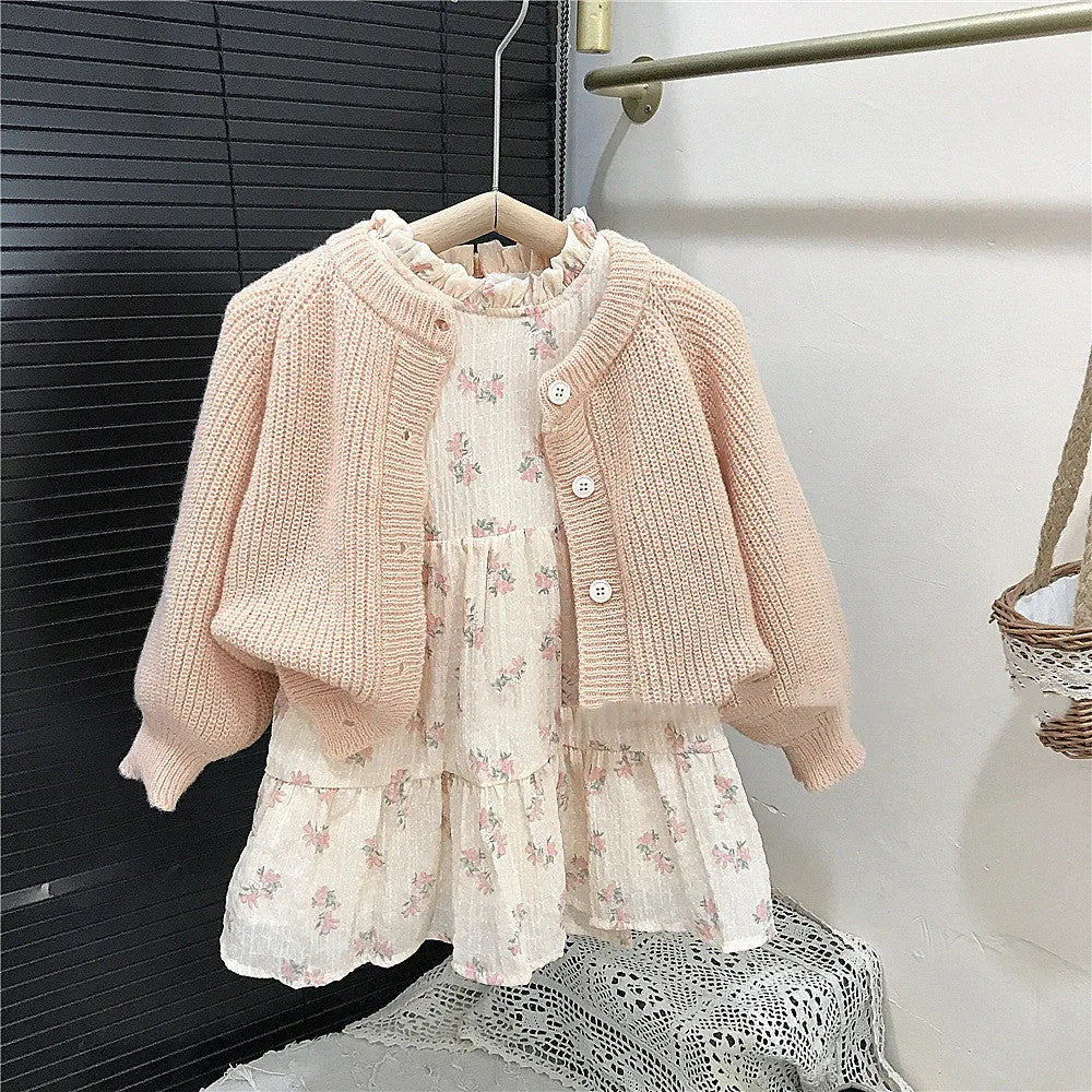 Girls' pink mohair puff sleeve knitted cardigan with orange flower chiffon dress set on white background