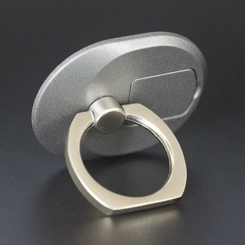 Elice handset ring support in gold colour on back of mobile phone showing grip and stand function