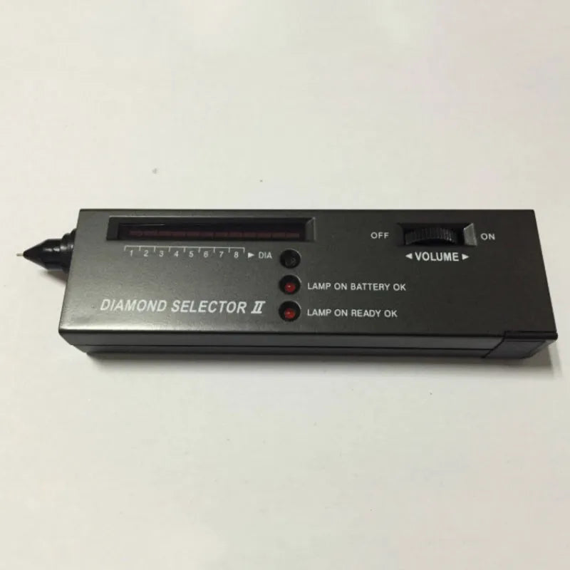Second generation portable diamond thermal conductivity tester with metal probe on black background