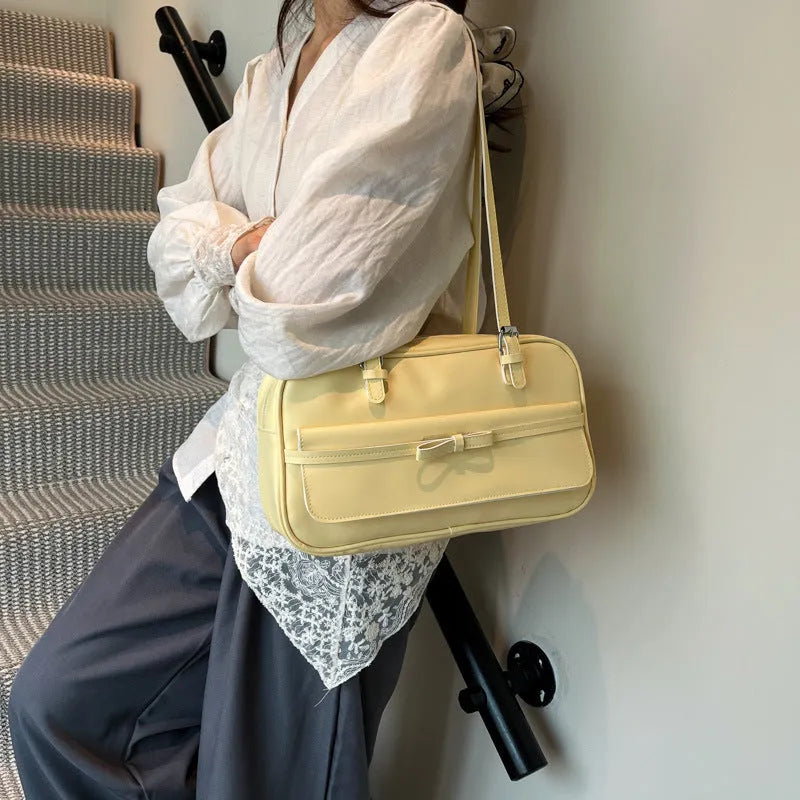 PU leather single shoulder flap bag in horizontal square shape with double straps and pearl bow decoration