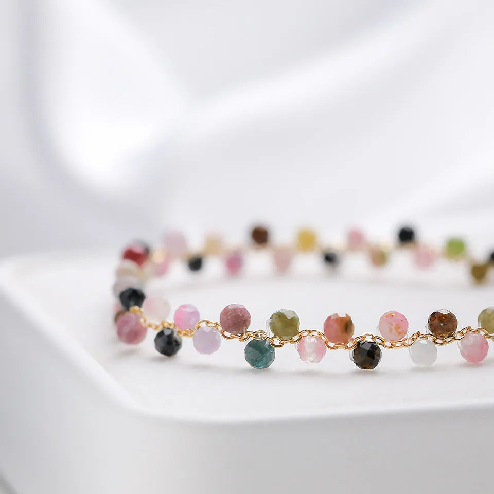 Hand-woven natural stone bracelet with tourmaline, amethyst, lapis lazuli and other crystal beads, adjustable fit