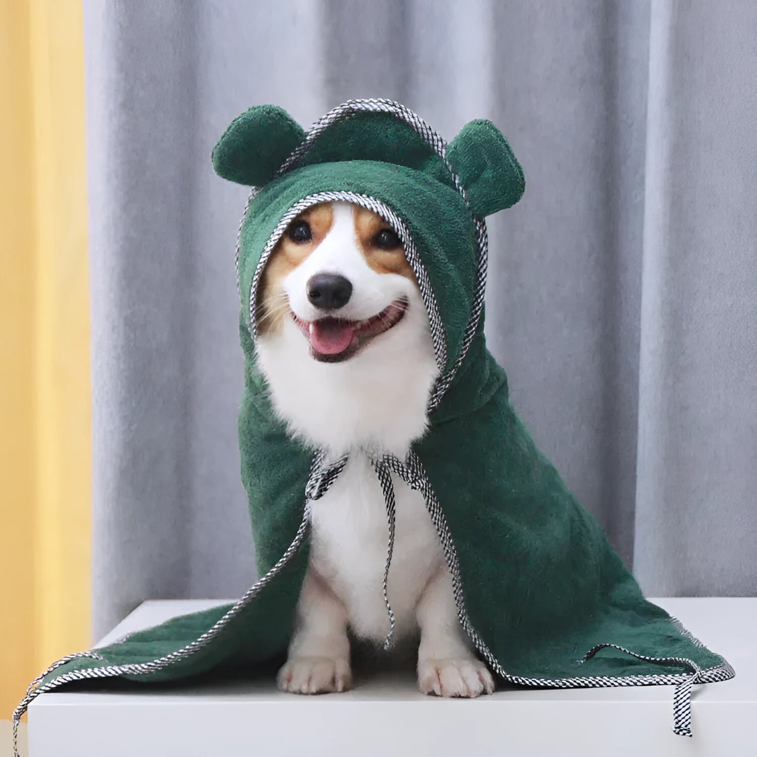 Grey and green ultra fine fibre pet towels for dogs and cats in small, medium, and large sizes.