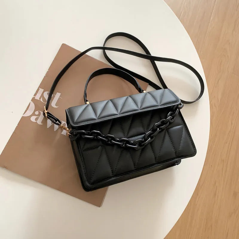 Casual small square PU shoulder messenger bag in black on a white background