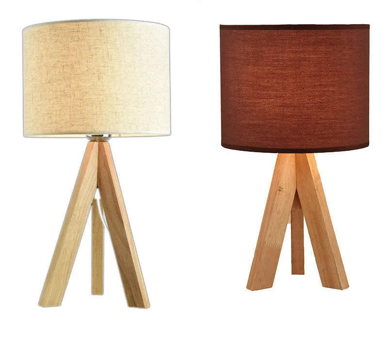 Japanese style solid wood table lamp with fabric lampshade in brown trumpet colour on bedside table