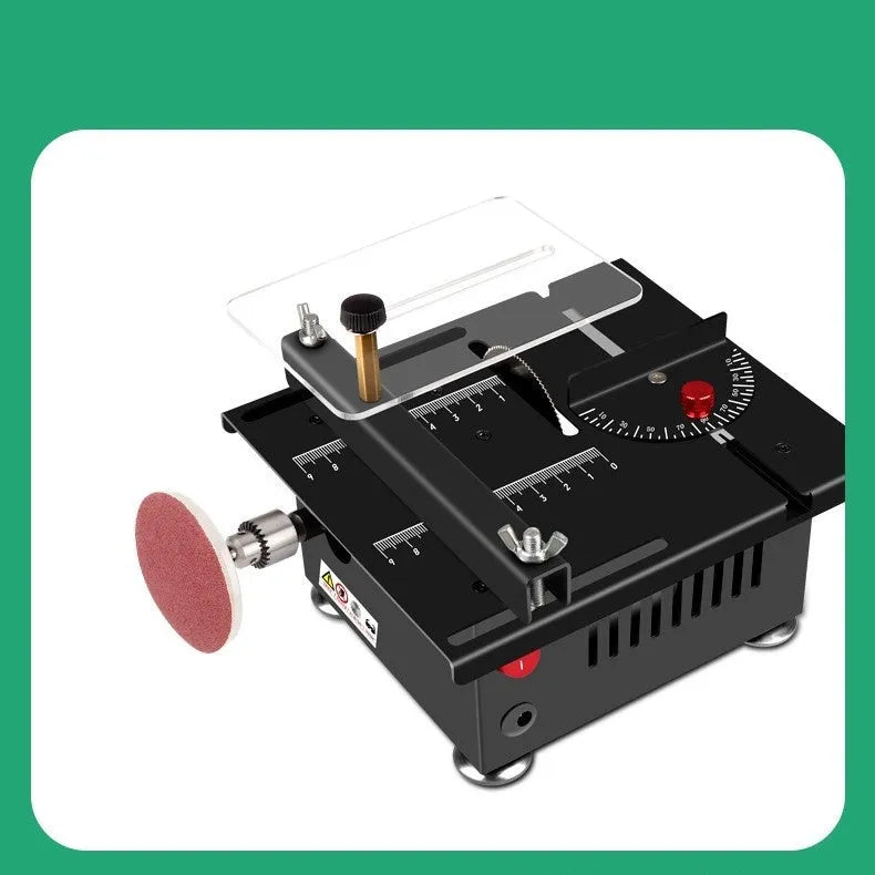 Lithium-ion battery-powered micro desktop saw with metal body on a workbench.