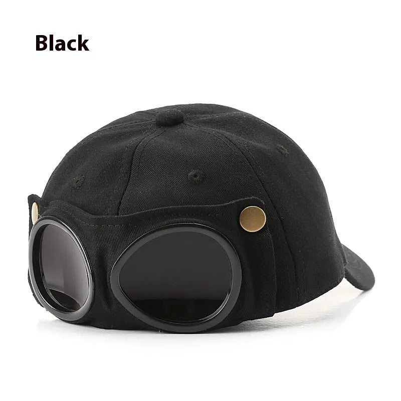 Men's cotton peaked cap in free size with dome crown, satin processing, and letter detailing, shown in monochrome design.