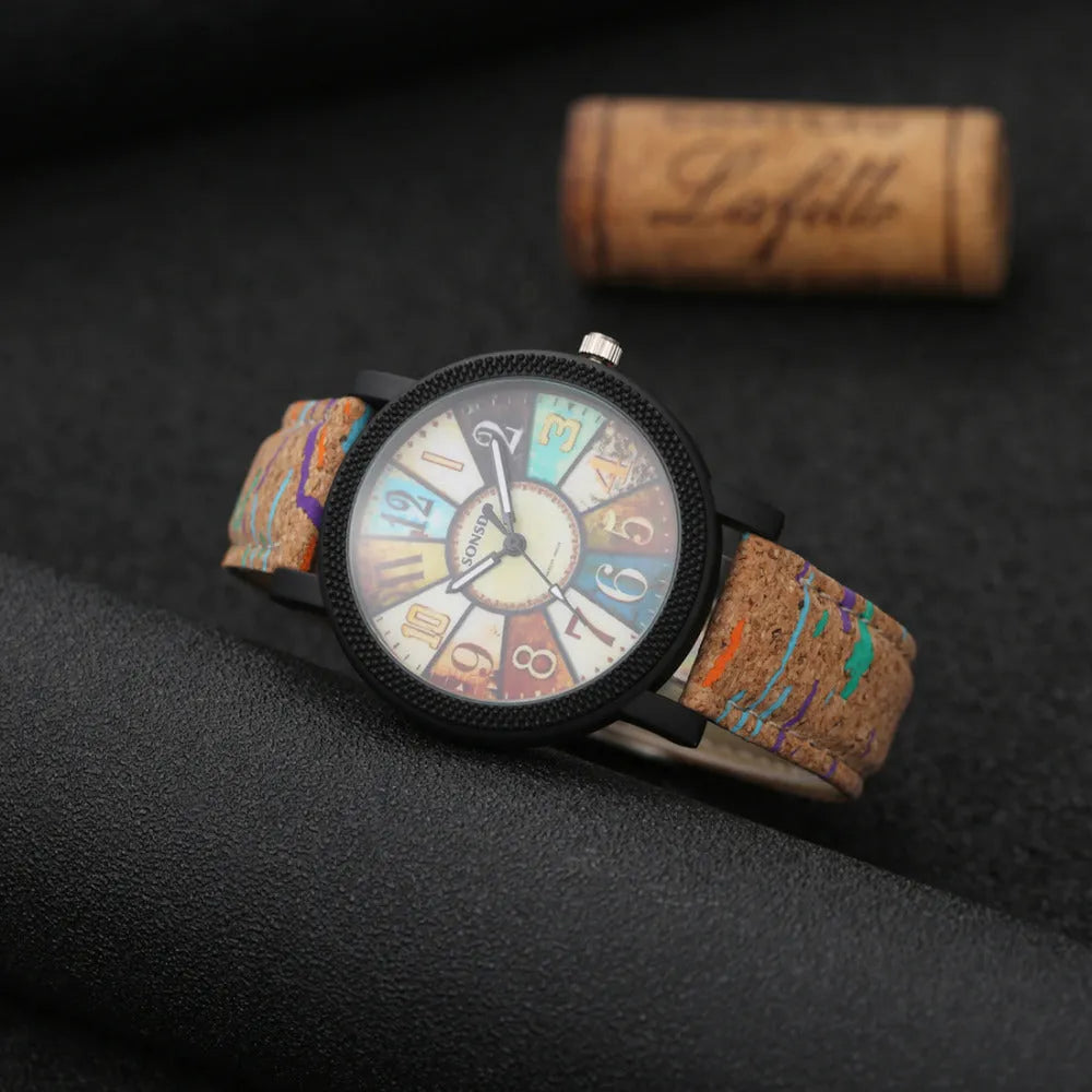 Vintage leather women's quartz watch showing 37mm round dial with tempered glass and stainless steel buckle