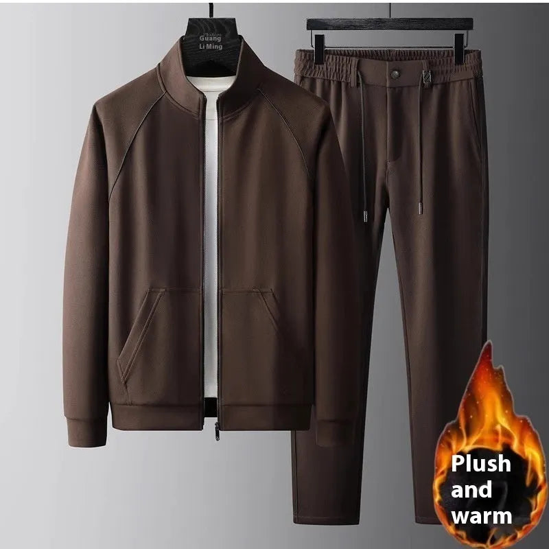 Men's slim fit stand collar tracksuit set in Vinylon fabric shown in black colour.