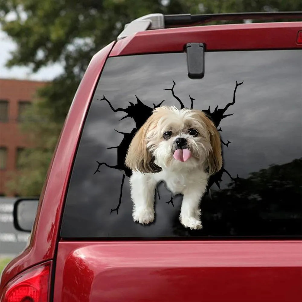 Reflective torn-paper style dog silhouette window decal shown in three sizes.