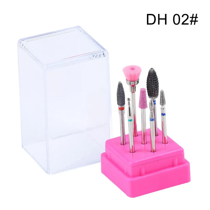 Set of seven tungsten steel nail drill bits and a brush in a transparent plastic case.