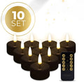 Set of four black S10 flameless LED tealight candles showing size.