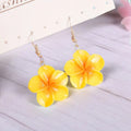Handmade resin Plumeria Rubra earrings in seven colours including pink, blue, purple, white, green, yellow, and rose red