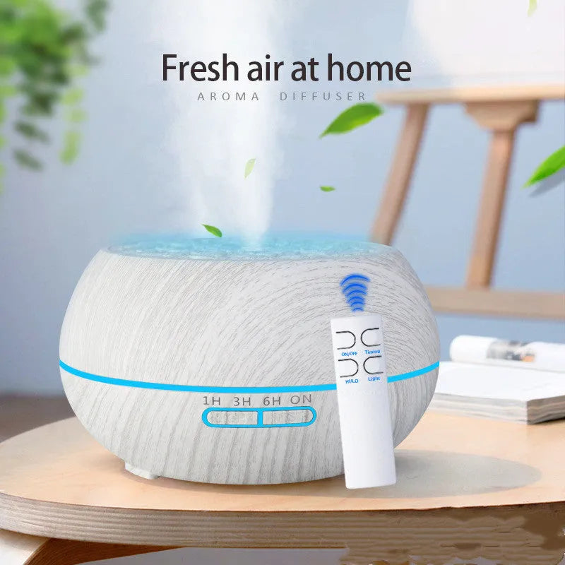 Four-hole misting ultrasonic aroma diffuser in dark wood grain finish with 400ml capacity and control buttons