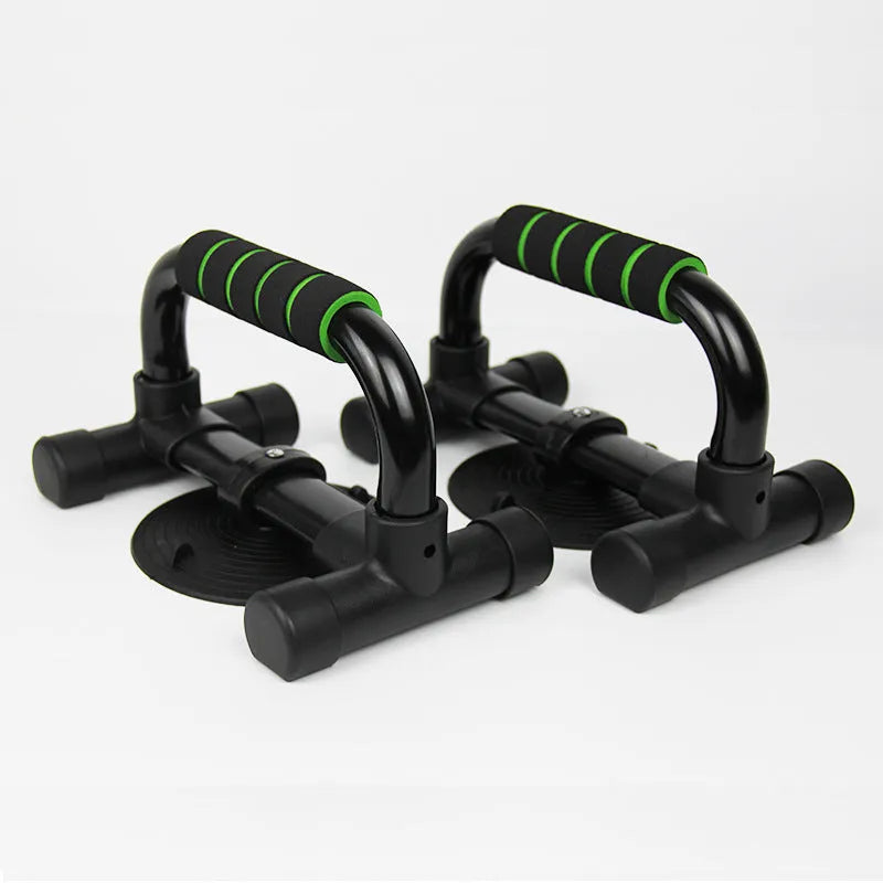 Green suction cup push up stand with electroplated steel frame and foam handles on a smooth floor