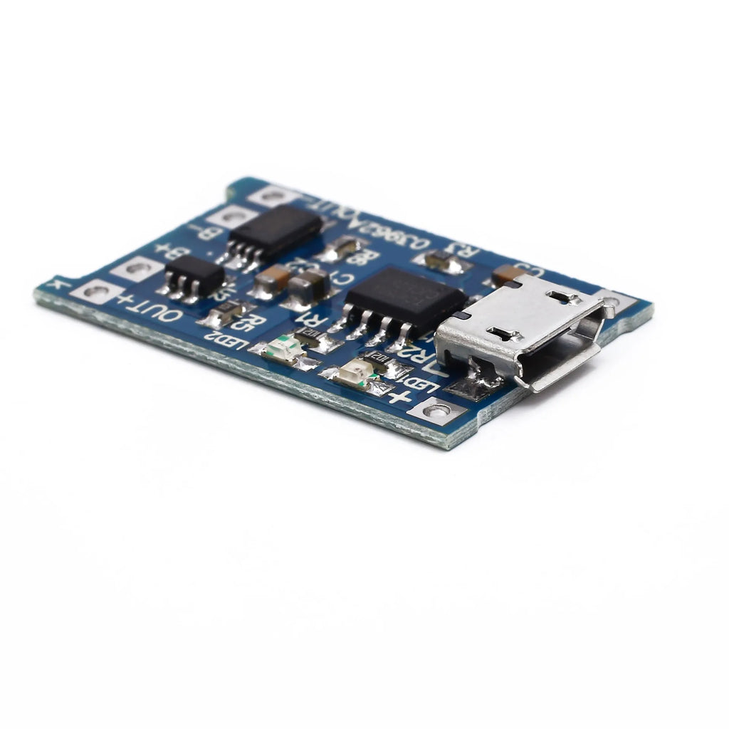 Small blue PCB for charging and protecting a single 3.7V lithium battery, showing solder pads for 5V input, battery, and output.