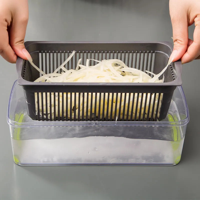 Manual vegetable cutter with multiple stainless steel blades on a wheat straw plastic body, shown in blue.