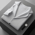 Men's cashmere lapel cardigan in light grey showing thickened knit construction and loose fit