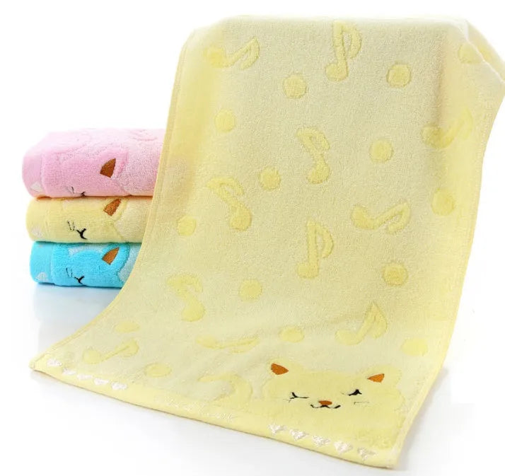 Set of four bamboo fiber kitten face bath towels in blue, green, pink, and yellow, each 25x50cm