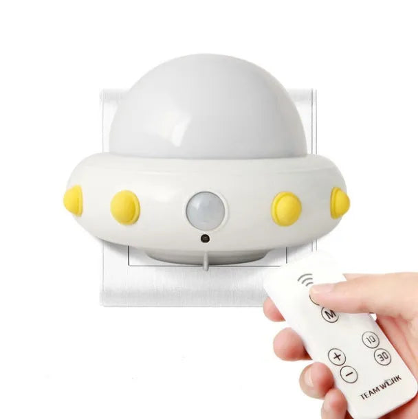 Remote control UFO bedside night light in blue, pink, or white with colourful LED lighting