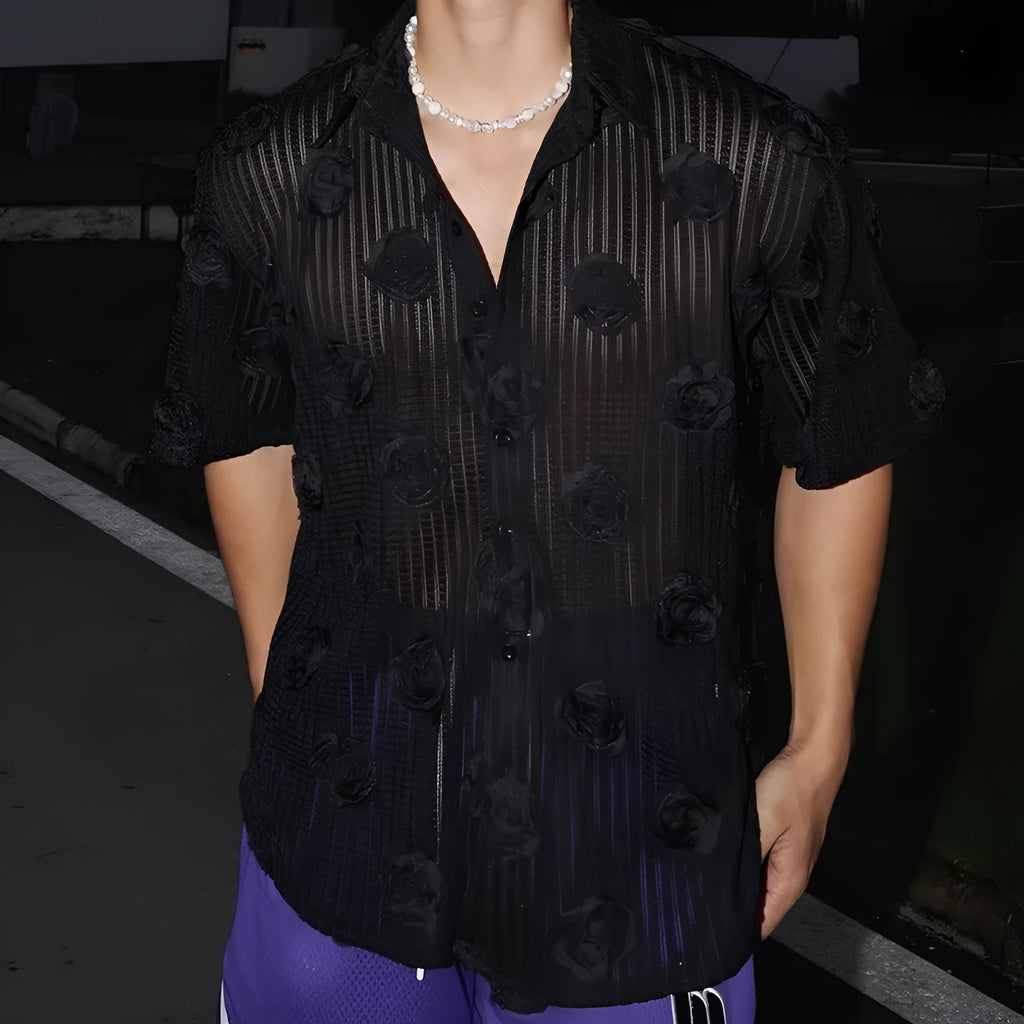 Man's loose-fit short-sleeve shirt with a white and black three-dimensional floral print on heavyweight fabric.