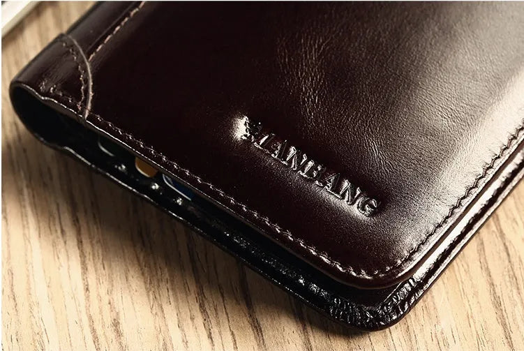 Men's black full-grain leather bifold wallet open, showing card slots, note pocket, and zipped coin compartment.