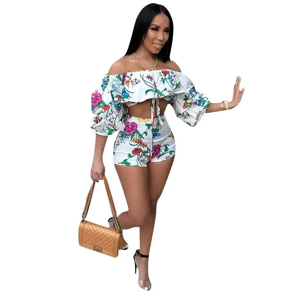 Women's multicolour digital print two-piece suit with a pile sleeve jacket and matching shorts.