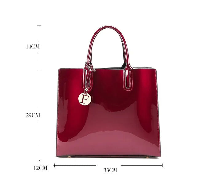 Three soft patent leather handbags in solid colours for women, shoulder and crossbody style with zipper closure
