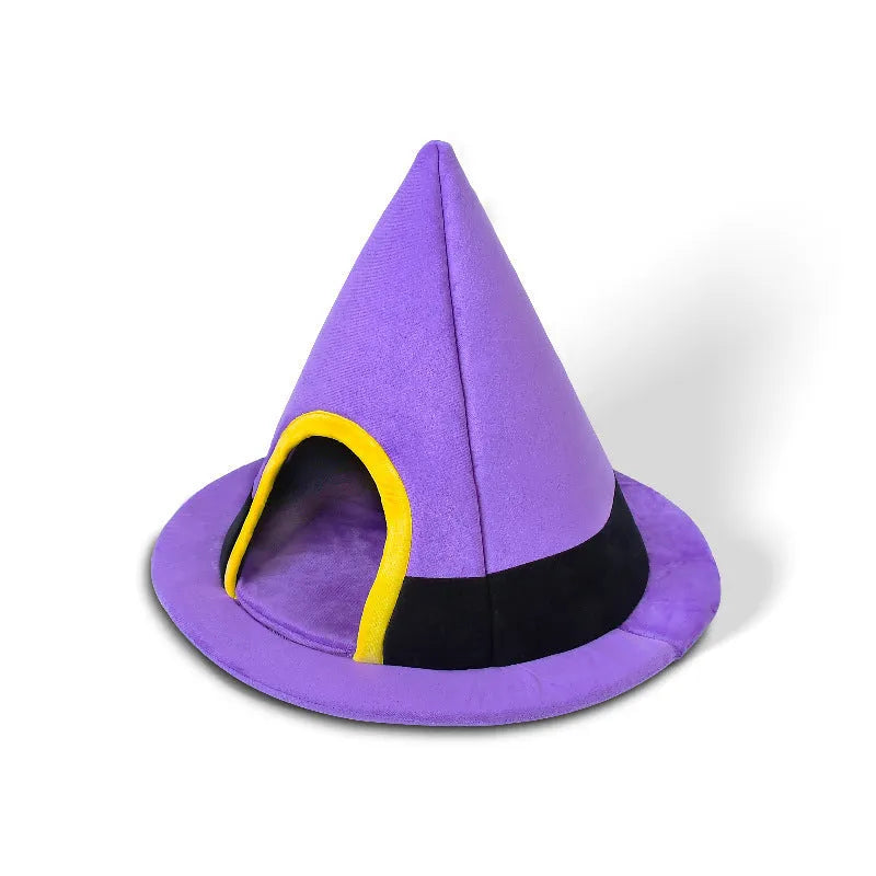 Purple cloth Halloween witch hat shaped cat bed measuring 60 by 45 cm.