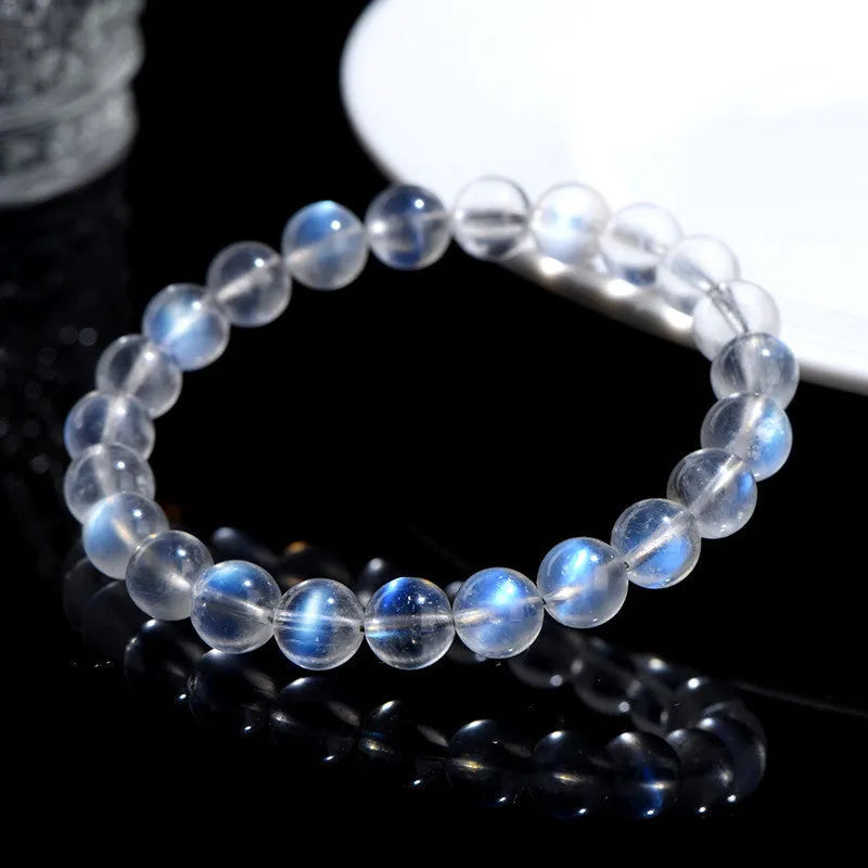 Natural cream body crystal bracelet with blue moonlight gemstone in simple unisex design