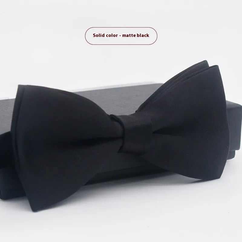 Men's flat head style solid colour bow tie on white background
