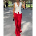 Women's deep V-neck sleeveless top and high waist wide leg pants two-piece set in beige polyester
