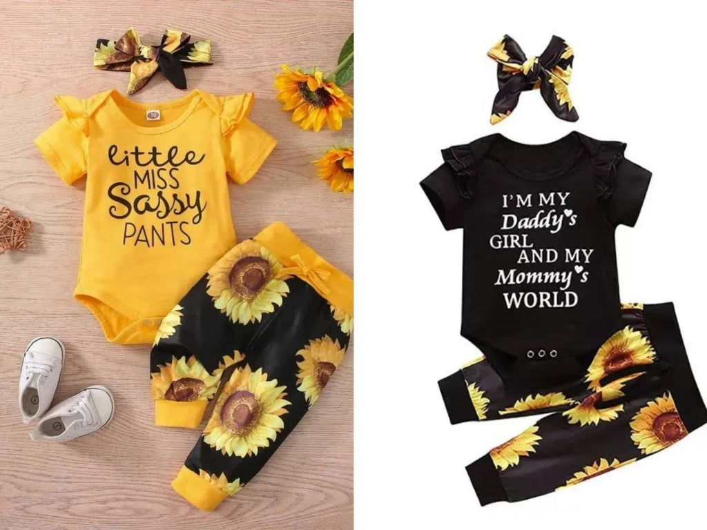 Baby jumpsuit set with cotton top, pants, and matching headband in black letter print