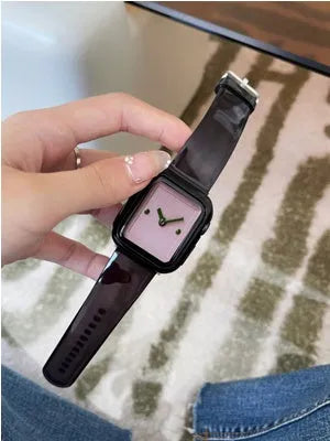 Brown transparent silicone replacement strap for Apple Watch, showing connector for compatible models.