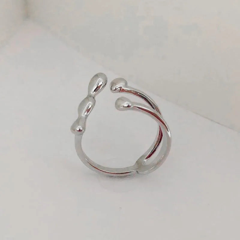 Brass spherical ring for women in gold or silver plating.
