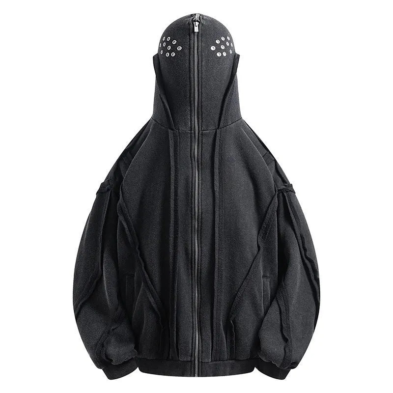 Man wearing a black retro-style zip-front cotton hooded coat with abstract pattern.