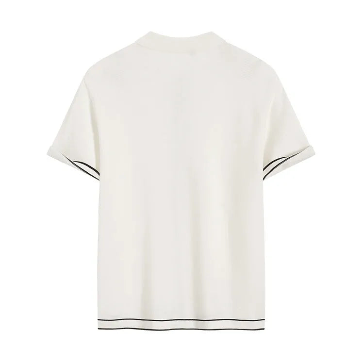 White short sleeve cardigan with contrasting colour lapels on a hanger