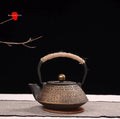Japanese style cast iron teapot with decorative patterns in 0.9 litre capacity