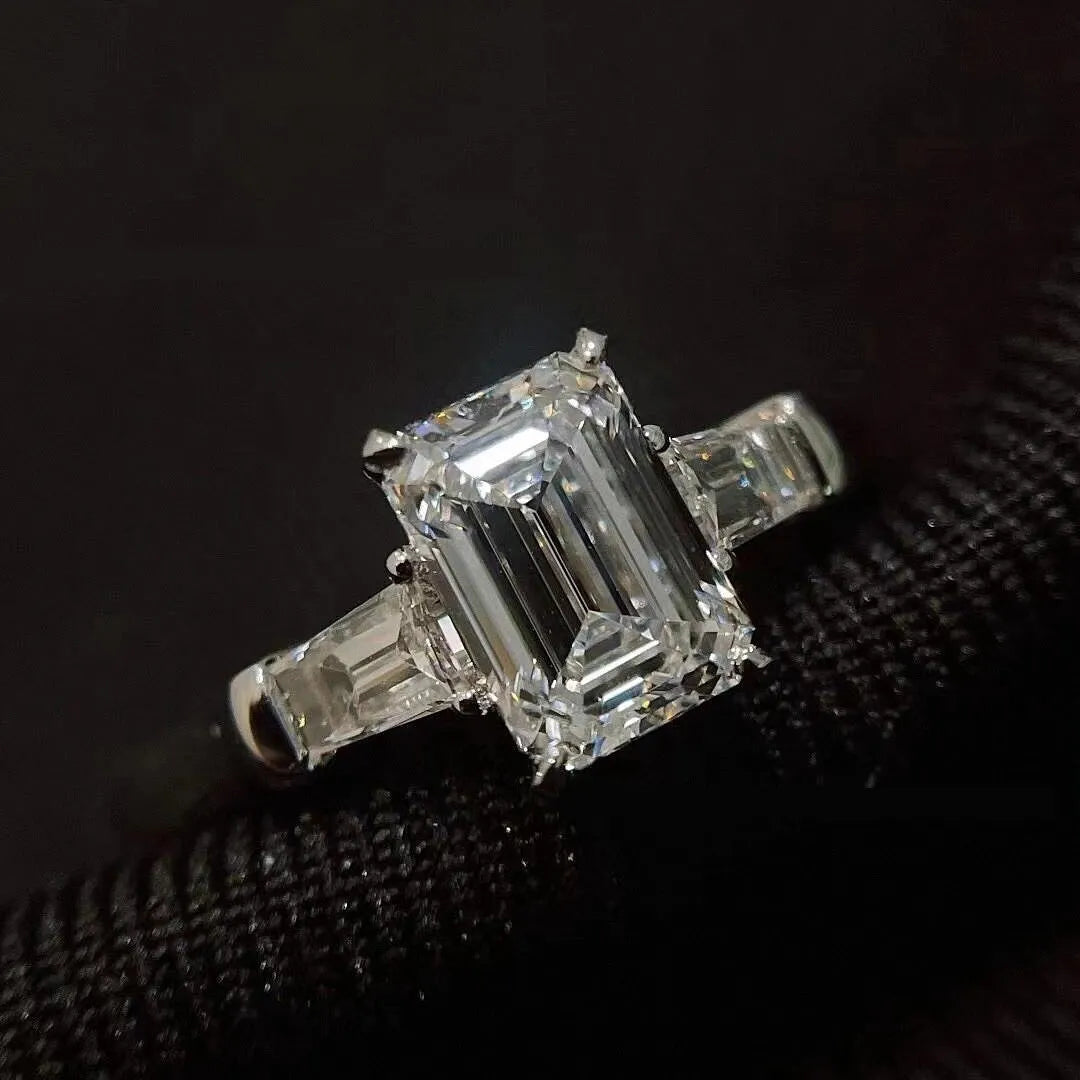 New Seiko Small Sugar Cube Ring women's simple design V GOLD square ring on a plain background