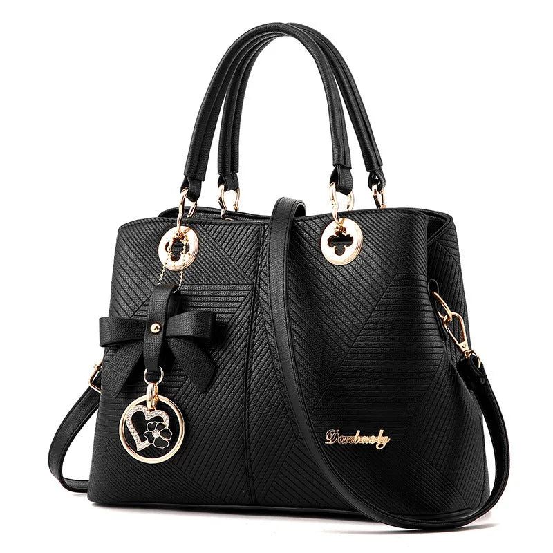 Retro style PU handbag in multiple colours showing zip opening and adjustable shoulder strap