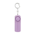 Compact pink personal safety alarm with keyring, showing dimensions.