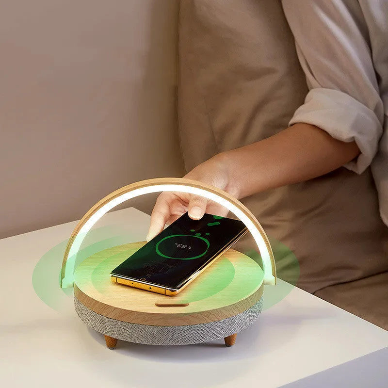 Wireless charging pad with integrated LED night light and Bluetooth speaker in marble pattern finish