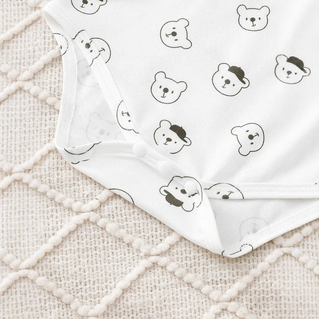 Green bear printed long sleeve round neck romper with corduroy suspender trousers baby suit on white background