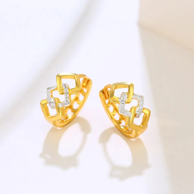 Gold geometric hollow-out earrings with electroplated alloy construction and ear clip fastening