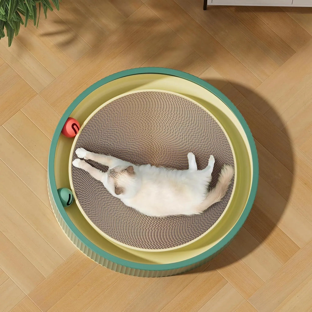 Large circular green cat scratching board with integrated ball toys measuring 45cm diameter