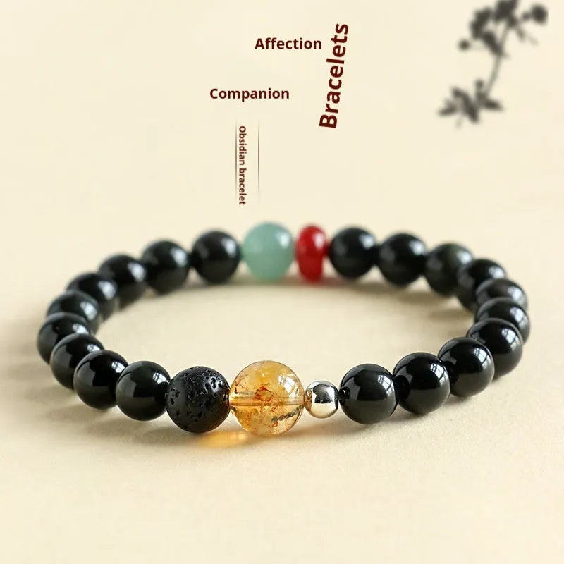 Chinese-style natural stone couple bracelet with obsidian, yellow tower crystal, agate, and jade beads.
