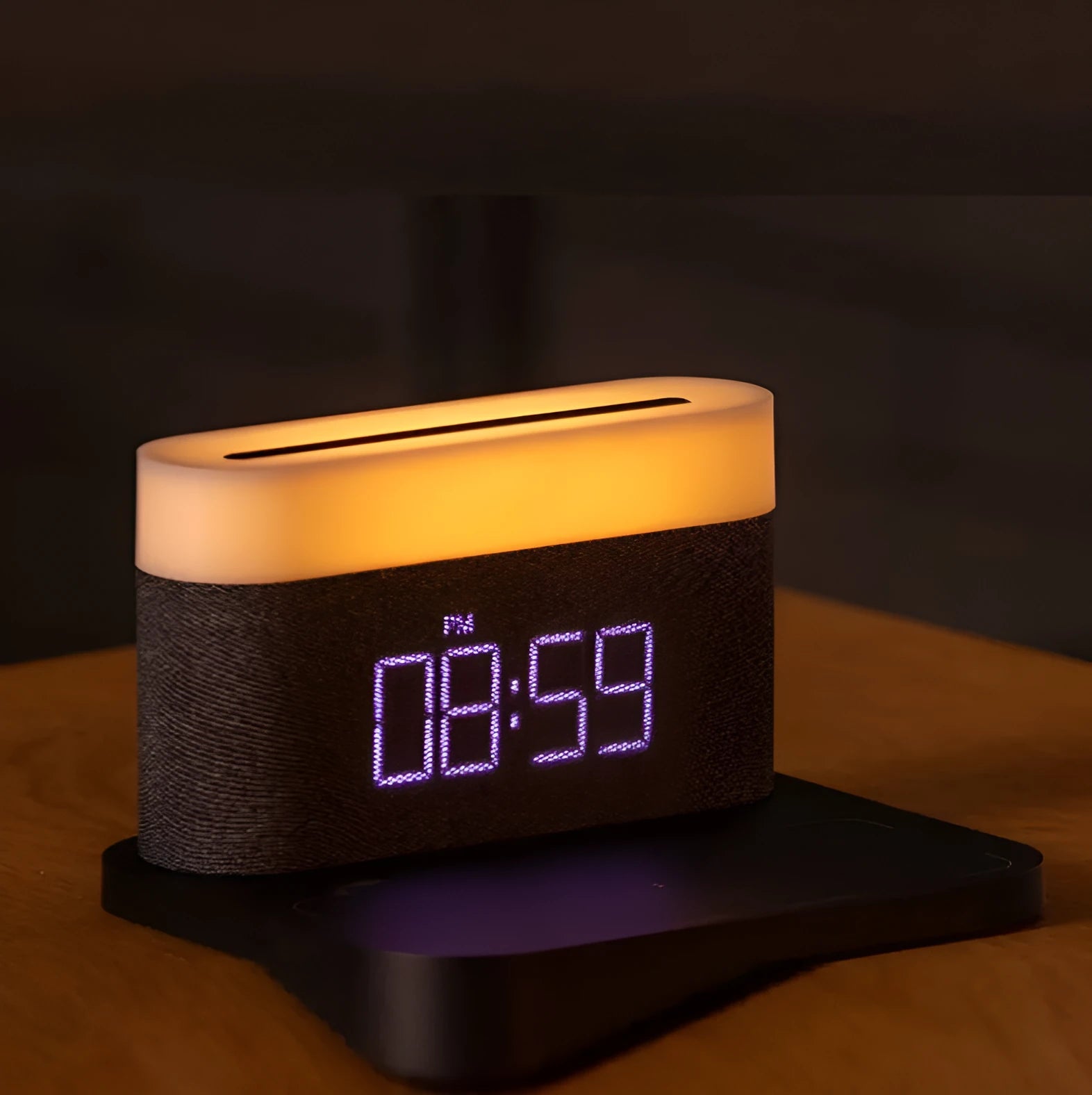 White wireless charging bedside lamp with digital alarm clock display on nightstand