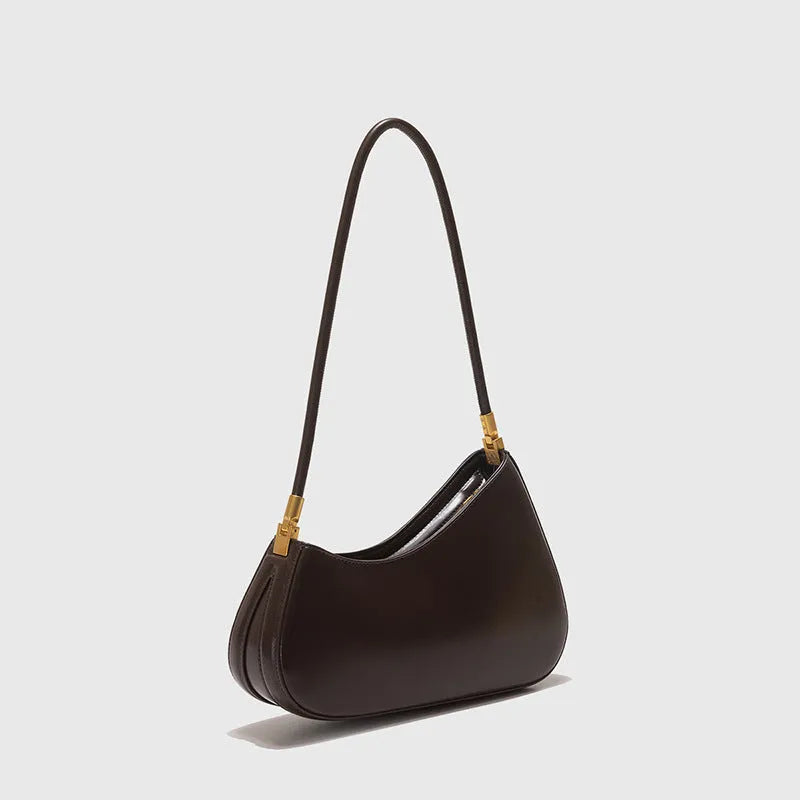 Retro oval women's underarm bag in seven colour options with single shoulder strap and sandwich pocket