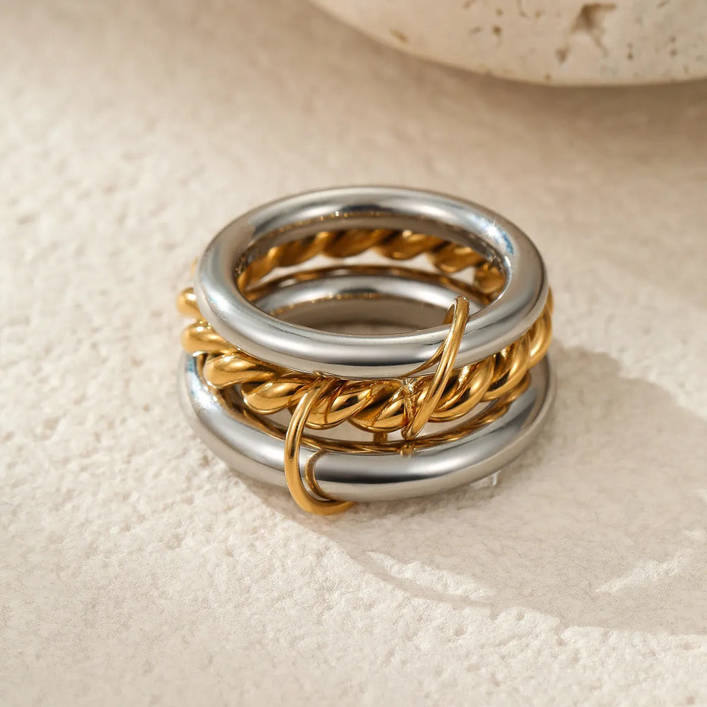 Stacked stainless steel rings with 18K gold plating in free size adjustable design